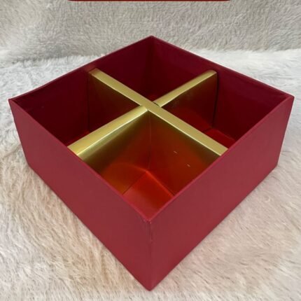 Empty red Gold Foil Hamper Box with gold compartments, perfect for luxury corporate gifting displays.