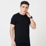 PUMA Dry Cell ESS Tee With Company Logo_Front_Black