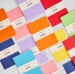 Colorful myPAPERCLIP Neo Basic Notebooks, ideal for corporate gifting, on a light grey background.