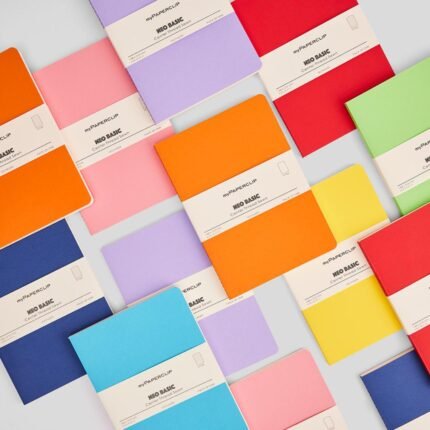 Colorful myPAPERCLIP Neo Basic Notebooks, ideal for corporate gifting, on a light grey background.